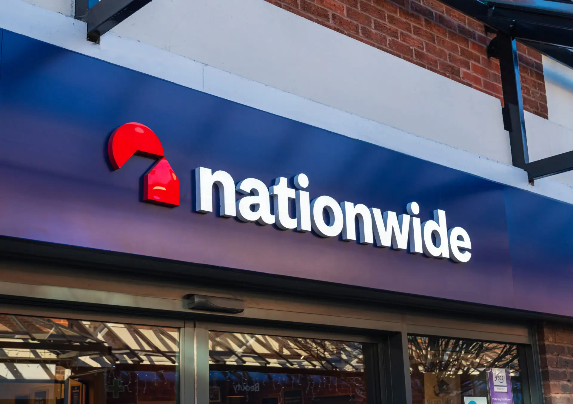 Image of Nationwide's new brand identity, displayed on the front of a bank.